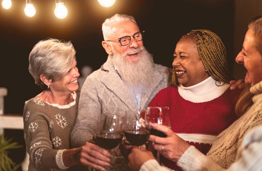 group-of-seniors-enjoying-some-wine-together