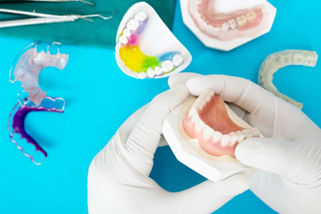 fitting dentures to clients teeth for perfection fitting dentures to clients teeth for perfection